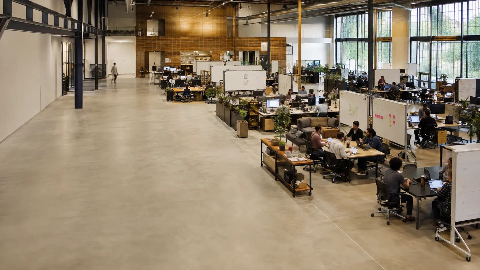 People working across an open office